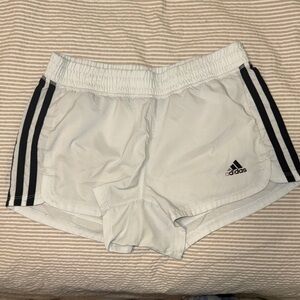 Adidas Women's White Athletic Shorts with Black Stripes